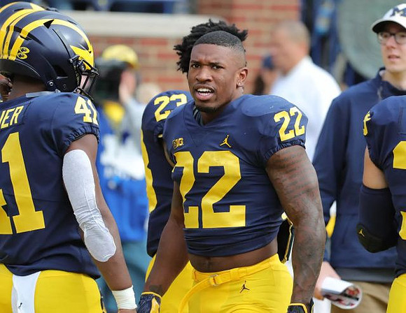 Christian Turner (41) and Karan Higdon (22)