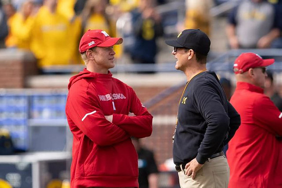 Nebraska Head Coach Scott Frost and Jim Harbaugh