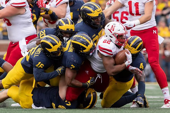Jaylen Kelly-Powell (16), Brad Hawkins (20), Khaleke Hudson (7), Reuben Jones (4), and Donovan Jeter (95)