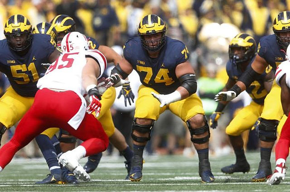 Cesar Ruiz (51) and Ben Bredeson (74)