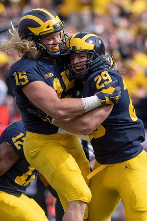 Josh Ross (12), Chase Winovich (15), and Jordan Glasgow (29)