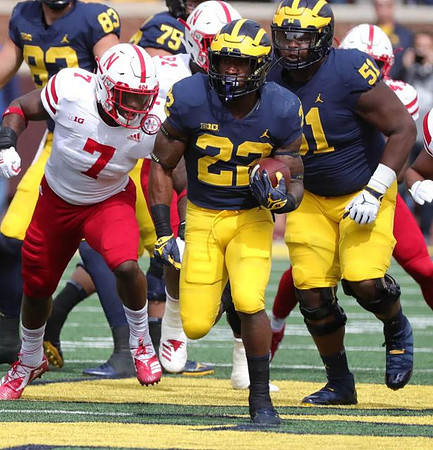 Zach Gentry (83), Jon Runyan Jr. (75), Cesar Ruiz (51), and Karan Higdon (22)