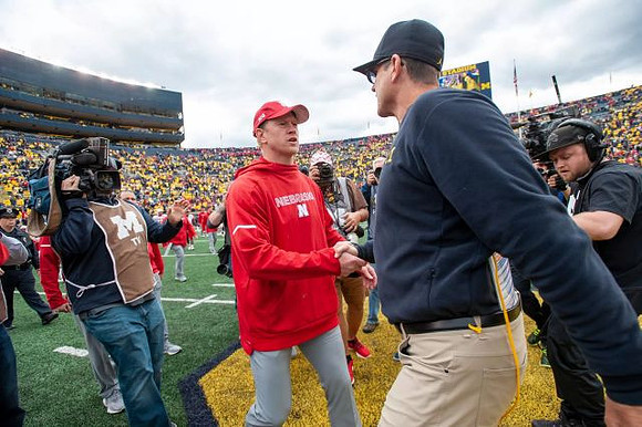 Nebraska Head Coach Scott Frost and Jim Harbaugh
