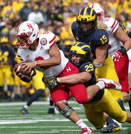 Jordan Glasgow (29) and Chase Winovich (15)