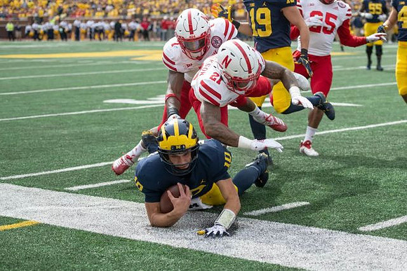 Dylan McCaffrey (10), Brendan White (19), and James Hudson (55)