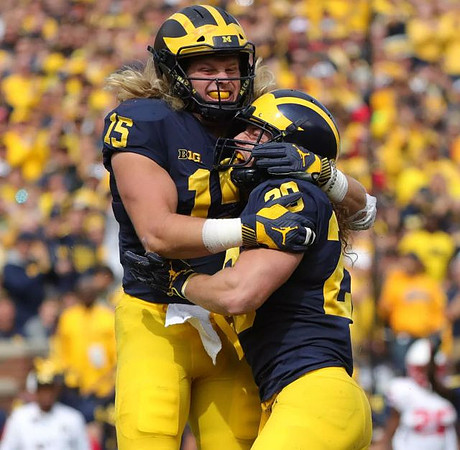 Chase Winovich (15) and Jordan Glasgow (29)
