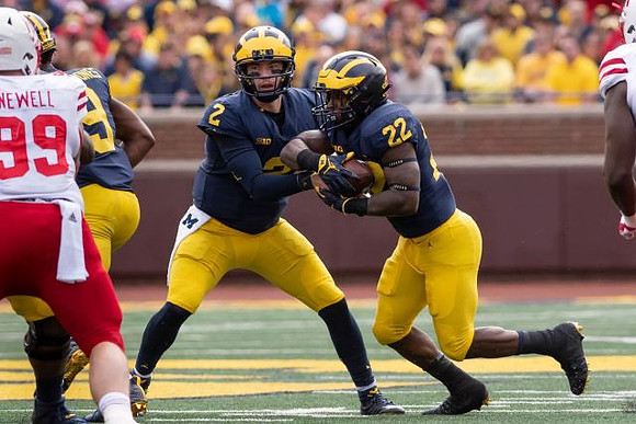Shea Patterson (2) and Karan Higdon (22)