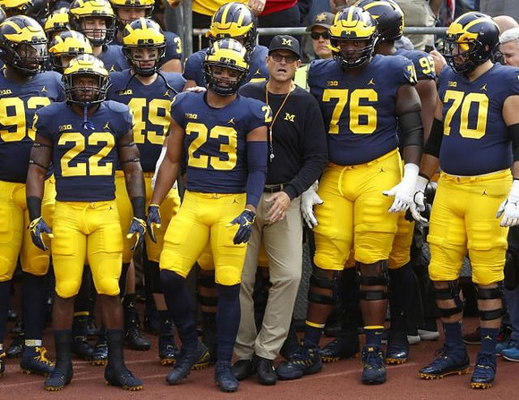 Jim Harbaugh and Michigan Team
