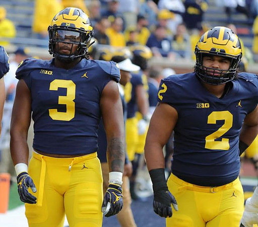 Rashan Gary (3) and Carlo Kemp (2)