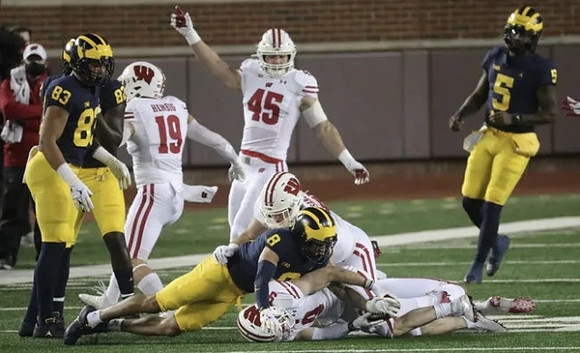 Erick All (83), Nick Eubanks (82), Ronnie Bell (8), and Joe Milton (5)