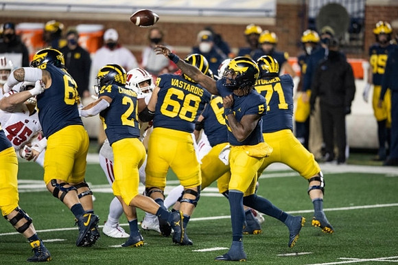 Chuck Filiaga (66), Zach Charbonnet (24), Andrew Vastardis (68), Joe Milton (5), and Andrew Stueber (71)