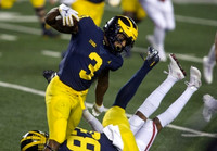 A.J. Henning (3) and Erick All (83)