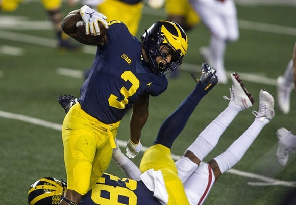 A.J. Henning (3) and Erick All (83)