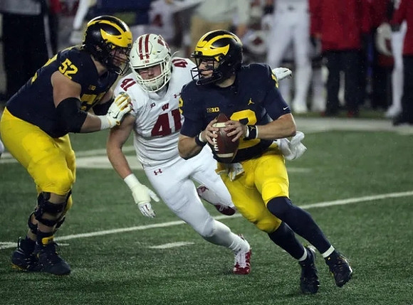 Karsen Barnhart (52) and Cade McNamara (12)