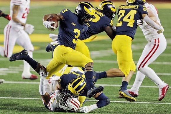 Erick All (83), A.J. Henning (3), Nick Eubanks (82), and Zach Charbonnet (24)