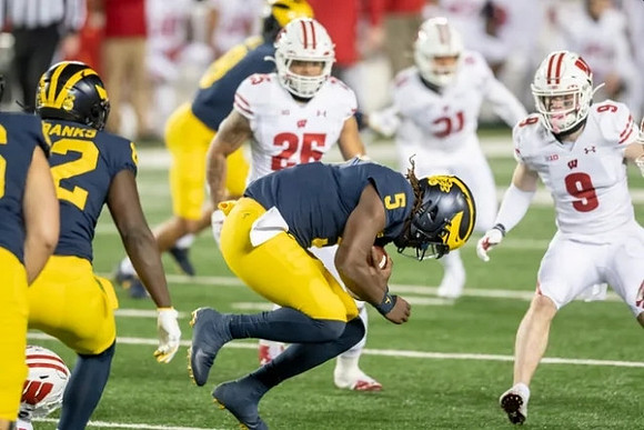 Nick Eubanks (82) and Joe Milton (5)