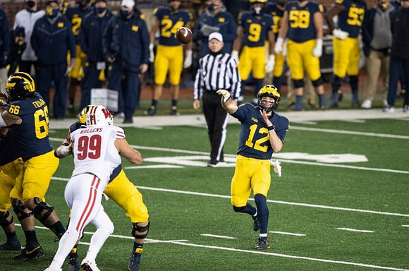 Chuck Filiaga (66) and Cade McNamara (12)