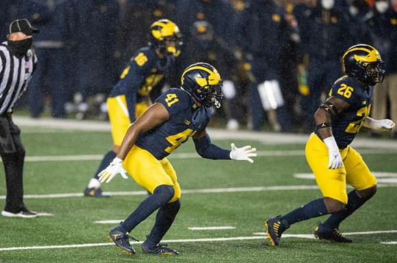 Jalen Perry (16), Nikhai Hill-Green (41), and Kalel Mullings (26)