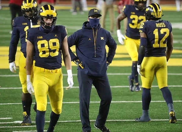 Carter Selzer (89), Jim Harbaugh, and Josh Ross (12)