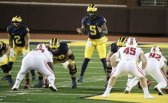 Blake Corum (2), Andrew Vastardis (68), and Joe Milton (5)
