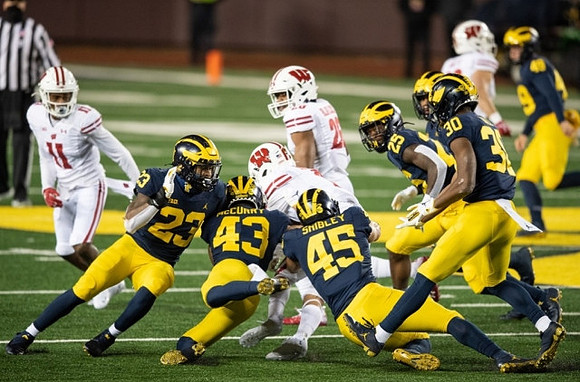 Michael Barrett (23), Jake McCurry (43), Adam Shibley (45), Hassan Haskins (25), Daxton Hill (30), and William Wagner (49)