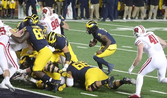 Nick Eubanks (82), Chuck Filiaga (66), Andrew Vastardis (68), and Joe Milton (5)