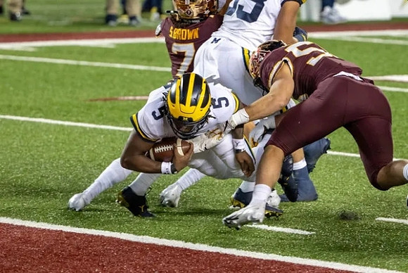 Joe Milton (5) and Erick All (83)