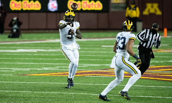 Joe Milton (5) and Erick All (83)