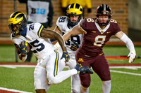 Hassan Haskins (25) and Carter Selzer (89)