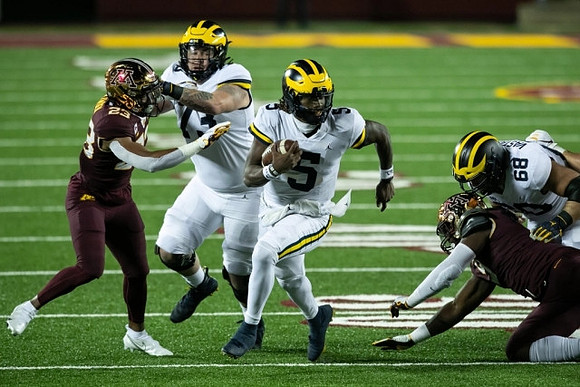 Jalen Mayfield (73), Joe Milton (5), and Andrew Vastardis (68)