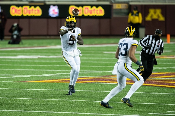 Joe Milton (5) and Erick All (83)