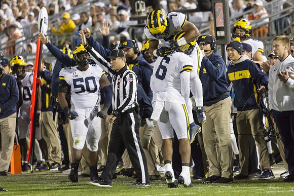 Michael Dwumfour (50), Khaleke Hudson (7), and Josh Uche (6)