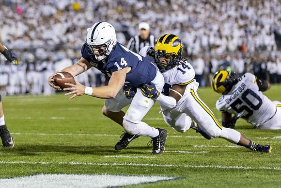 Josh Metellus (14) and Michael Dwumfour (50)