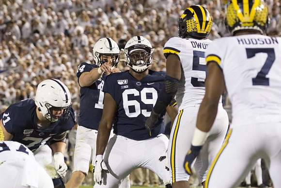 Michael Dwumfour (50) and Khaleke Hudson (7)