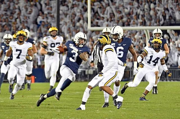 Khaleke Hudson (7), Aidan Hutchinson (97), Ambry Thomas (1), and Josh Metellus (14)