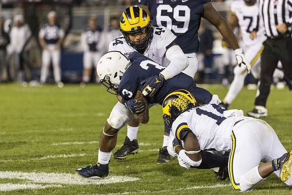 Cameron McGrone (44) and Josh Metellus (14)