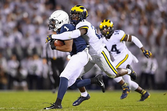 Brad Hawkins (20) and Josh Metellus (14)