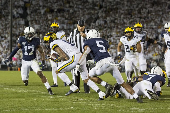 Ronnie Bell (8), Nick Eubanks (82), and Zach Charbonnet (24)