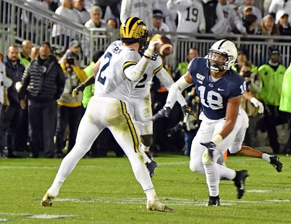 Shea Patterson (2) and Nick Eubanks (82)