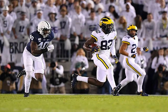Nick Eubanks (82) and Shea Patterson (2)