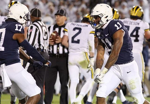 Shea Patterson (2) and Ben Bredeson (74)