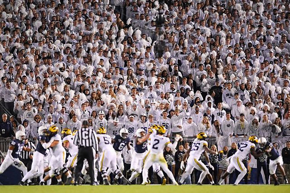 Michael Onwenu (50), Shea Patterson (2), Hassan Haskins (25), and Nick Eubanks (82)