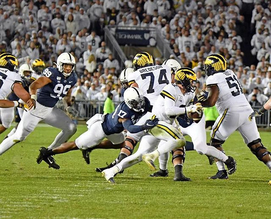 Ben Bredeson (74), Shea Patterson (2), and Cesar Ruiz (51)