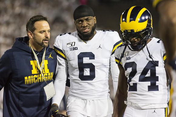 Josh Uche (6) and Lavert Hill (24)