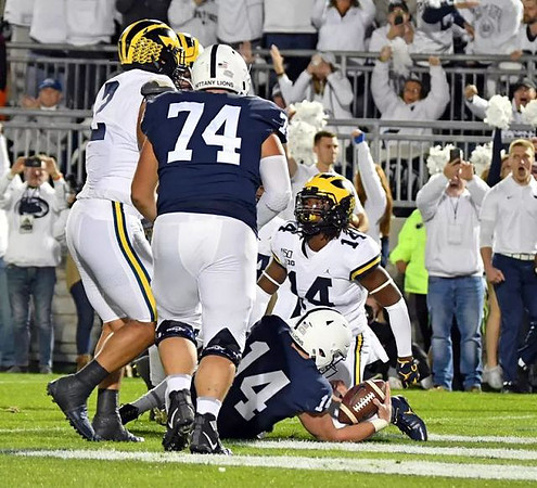 Carlo Kemp (2) and Josh Metellus (14)