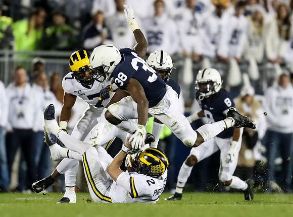 Tarik Black (7) and Shea Patterson (2)