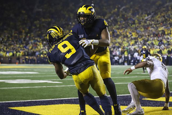 Donovan Peoples-Jones (9) and Nico Collins (4)