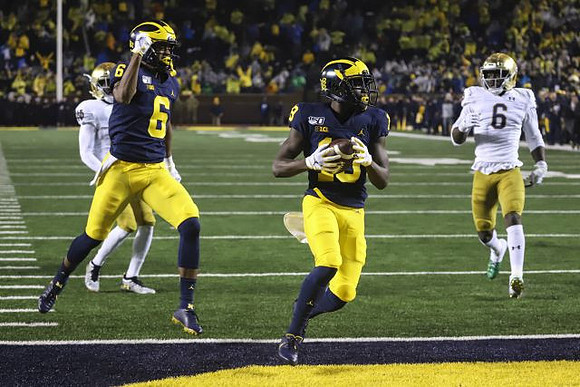 Cornelius Johnson (6) and Mike Sainristil (19)