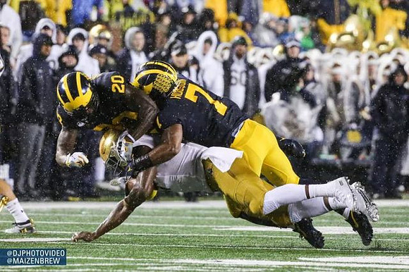 Brad Hawkins (20) and Khaleke Hudson (7)