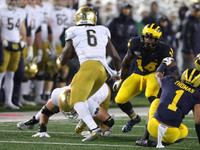 Josh Metellus (14) and Ambry Thomas (1)